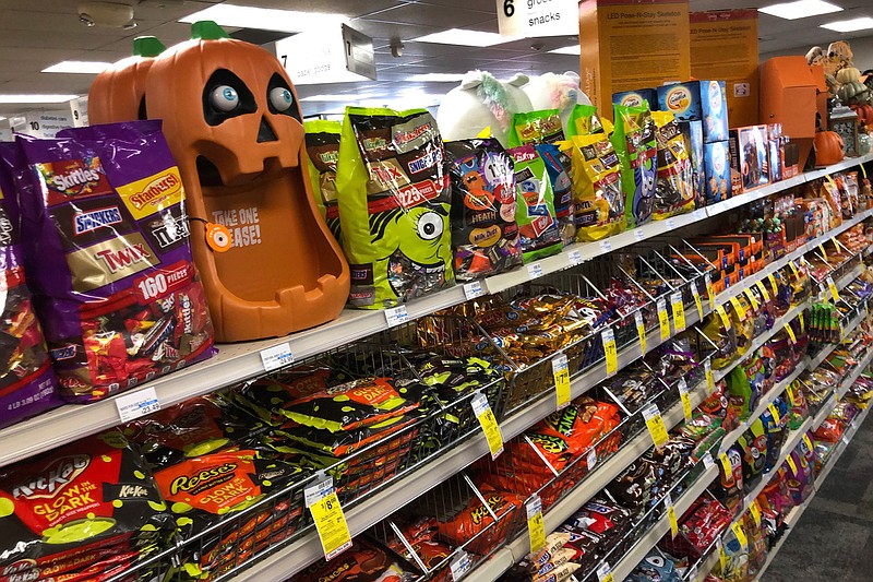 Halloween candy and decorations are displayed at a store, Wednesday, Sept. 23, 2020, in Freeport, Maine. (AP Photo/Robert F. Bukaty)