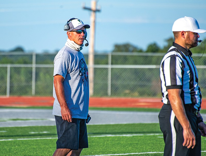 Blair Oaks coach Ted LePage watches his team during last month's Green and White scrimmage at the Falcon Athletic Complex in Wardsville.