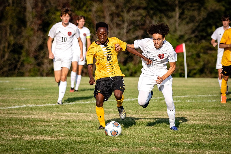 FILE: Christian Mahoro fights for possession during his freshman season in 2020. The Fulton midfielder had a standout sophomore season this year, earning several accolades including a second team all-state selection in Class 2.