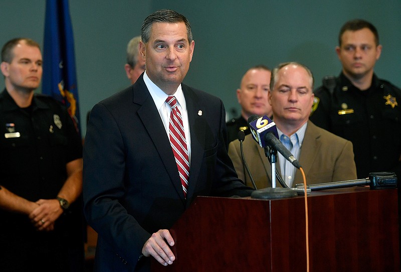 In this Oct. 19, 2018 file photo, U.S. Attorney David Freed speaks at a news conference at the Centre County Courthouse Annex in Bellefonte, Pa. Freed's office issued a statement on Thursday, Sept. 24, 2020, that nine mailed-in military ballots had been discarded by the local election office. The announcement was seized on by President Donald Trump and his supporters. The U.S. attorney's announcement of the investigation Thursday provided few details, but did mention the votes were for Trump. (Abby Drey/Centre Daily Times via AP, File)