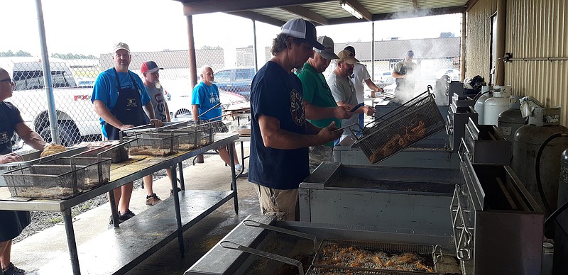 Union members feast at a fish fry on Friday. Plates were available to go or could be picked up and delivered to members who couldn't pick them up in person.