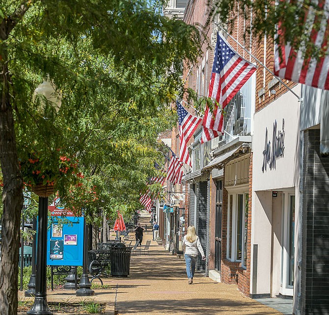 The trees and flags lining downtown's High Street provide an accent to the stores and businesses who choose to locate in downtown Jefferson City, which has been named one of the best state capitals in which to live.