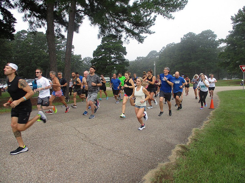 Local runners compete Saturday in the inaugural "Run TEAL There's a Cure" — a 3-mile race held at Spring Lake Park. The event raised funds for Ovarian Cancer research. Organizers, along with participants, are thinking about making it an annual event.