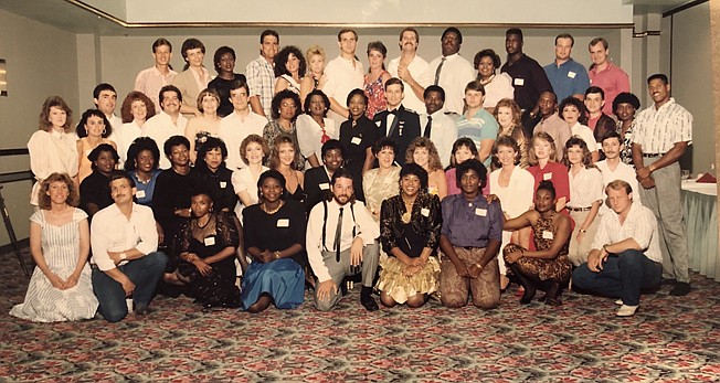 John Moore (third row, third from right) and the other members of his high school class of 1980 have remained close. They haven't allowed politics or other issues to damage or dissolve friendships.