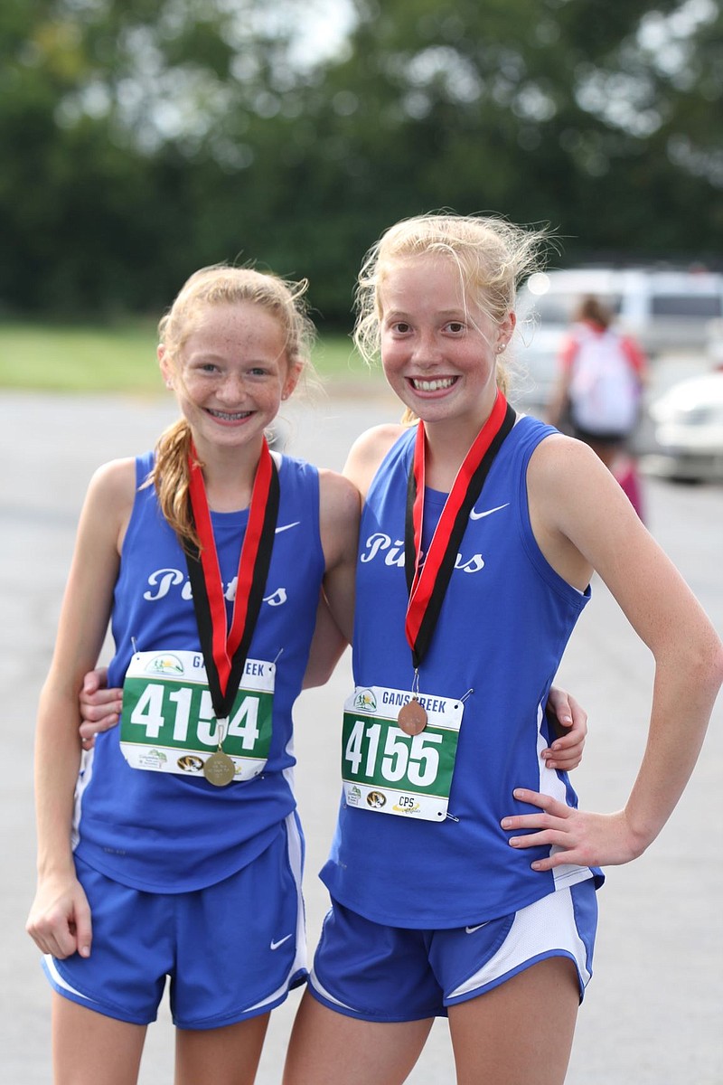 <p>Submitted</p><p>From left, Kenzleigh Goans finished in second place Sept. 22 at the middle school cross country meet at Boonville. She also finished in first place Sept. 23 at the meet at Southern Boone. Allie Heather finished in seventh place at the Boonville meet and in 16th place at the Southern Boone meet.</p>