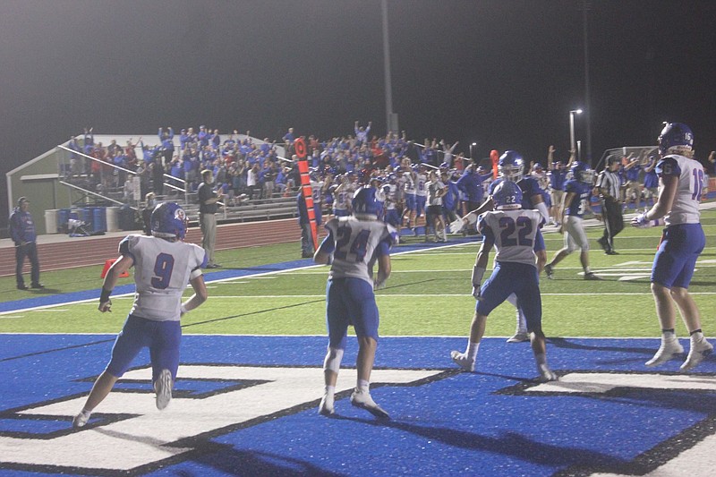 <p>Democrat photo/Kevin Labotka</p><p>California fans and players celebrate Sept. 25 after the Pintos’ dramatic 21-14 win over Boonville.</p>