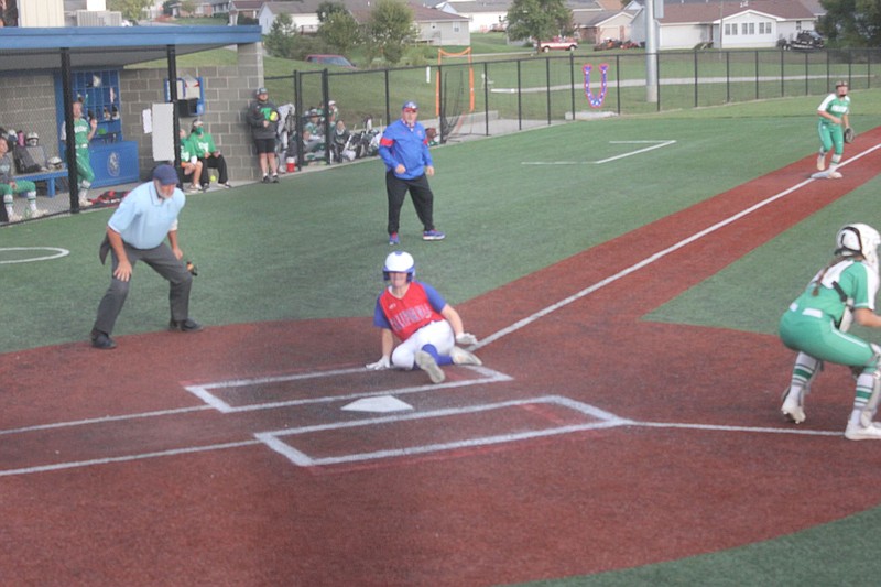 <p>Democrat photo/Kevin Labotka</p><p>Lauren Hill slides across home plate in the sixth inning of the Pintos’ 2-1 win over Blair Oaks on Sept. 29.</p>