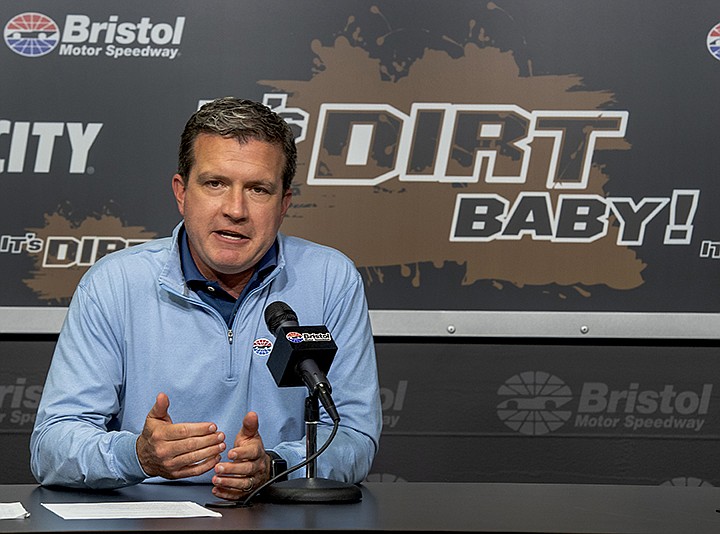 Jerry Caldwell, executive vice president and general manager of Bristol Motor Speedway, announces during a news conference, Wednesday, Spet. 30, 2020, in Bristol, Tenn., that the NASCAR Cup series auto race scheduled at the track for March 28, 2021 will be run on dirt. (David Crigger/Bristol Herald Courier via AP)