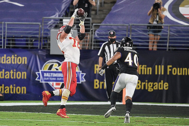 Chiefs offensive tackle Eric Fisher catches a pass for a touchdown during the second half of Monday night's game against the Ravens in Baltimore.