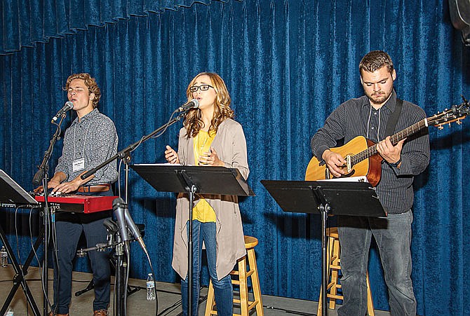 Praise & Worship musicians, from left, Silas Brown, Kathryn Fergerson and Caleb Dunn lead the gathering Saturday, Oct. 3, 2020, at the Missouri Prayerfest at the state Capitol.