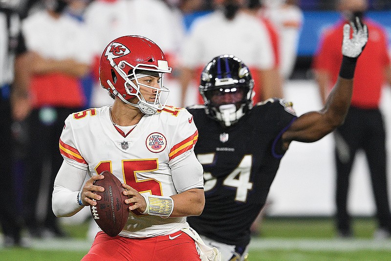 Chiefs quarterback Patrick Mahomes looks to pass under pressure from Ravens linebacker Tyus Bowser during the second half of last Monday night's game in Baltimore.