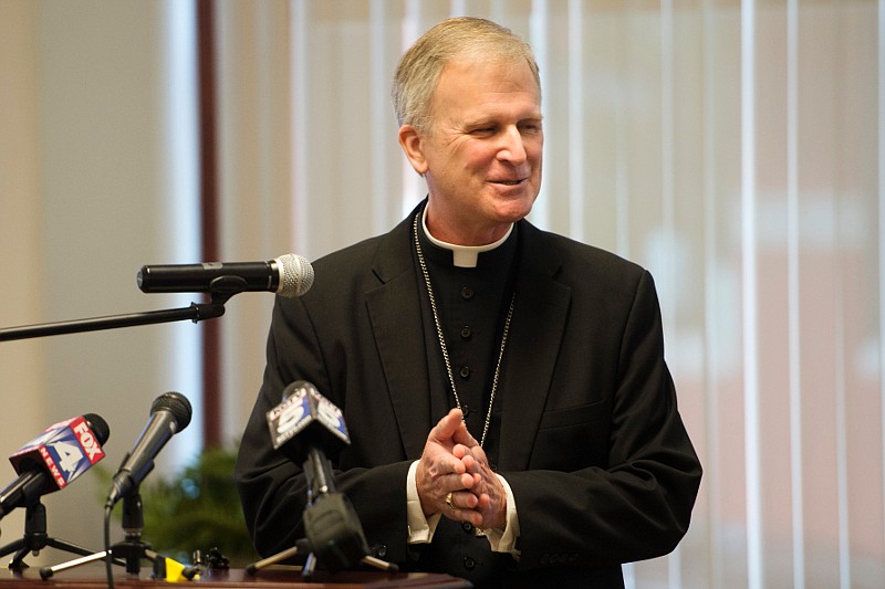 In this Sept. 15, 2015, file photo, Bishop James V. Johnston Jr. talks to the media during a news conference in Kansas City, Mo. (Joe Ledford/The Kansas City Star via AP, File)