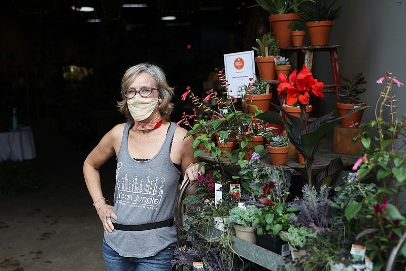 Co-owner Tara Alexander awaits customers needing help at Urban Jungle. (Tim Tai/The Philadelphia Inquirer/TNS) 