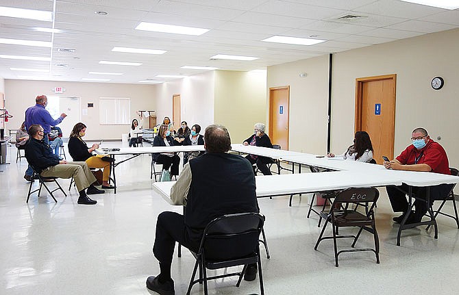 Representatives from area schools, county government, the Fulton Medical Center, Callaway County Health Department and the Callaway County Ambulance District gathered Tuesday to discuss the logistics of offering flu shot clinics to local children.