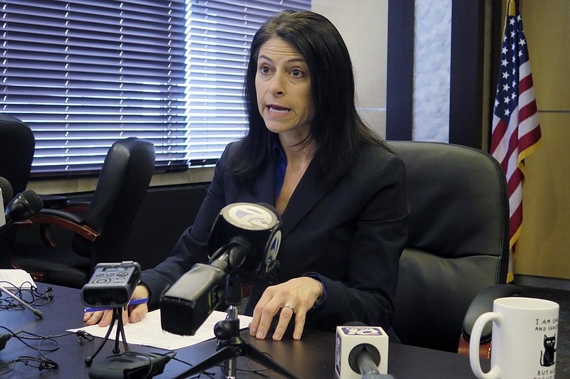 FILE - In this March 5, 2020, file photo, Michigan Attorney General Dana Nessel speaks during a news conference in Lansing, Mich. Nessel has charged seven people with plotting to target law enforcement and attack state Capitol building. The announcement comes after six others were charged with plotting to kidnap Michigan Democratic Gov. Gretchen Whitmer at her vacation home in reaction to what they viewed as her "uncontrolled power," according to a criminal complaint unsealed Thursday , Oct. 8, 2020, in federal court. (AP Photo/David Eggert, File)