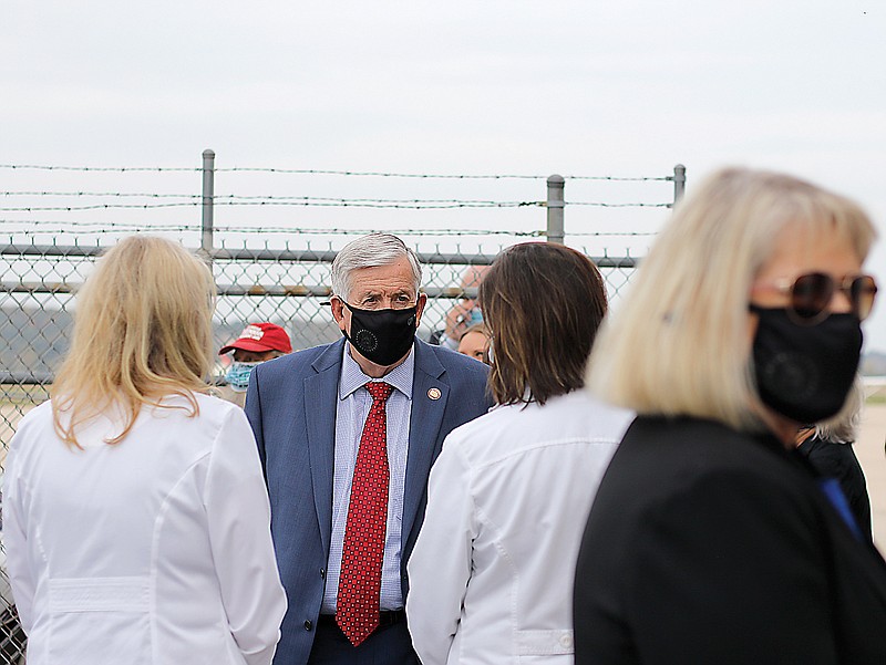 Gov. Mike Parson meets with local first responders Thursday as part of Operation Thank You, organized by the Spirit of Liberty Foundation, at the Jefferson City Memorial Airport. The Spirit of Liberty Foundation is an organization based in San Diego that has been flying around the United States with the goal of visiting every single state and thanking health care workers for their sacrifices and hard work during the pandemic.