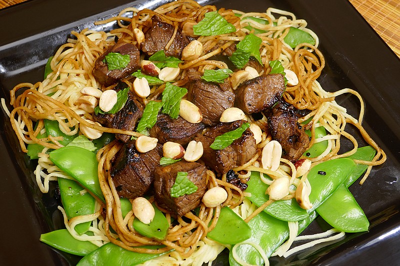 Vietnamese shaking beef and noodles. (Linda Gassenheimer/TNS)