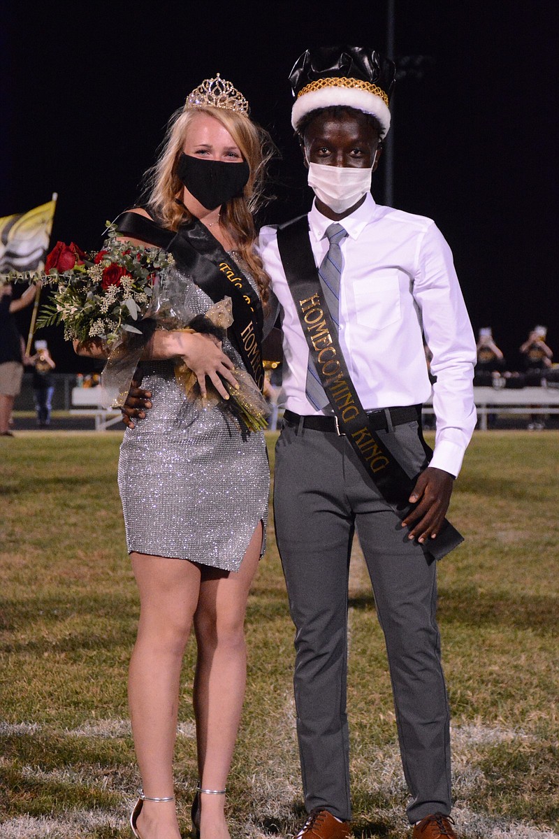 <p>Kayanna Gaines, left, and Clement Mahoro were named Fulton High School’s 2020 Homecoming queen and king during halftime at Friday’s Homecoming game.</p>