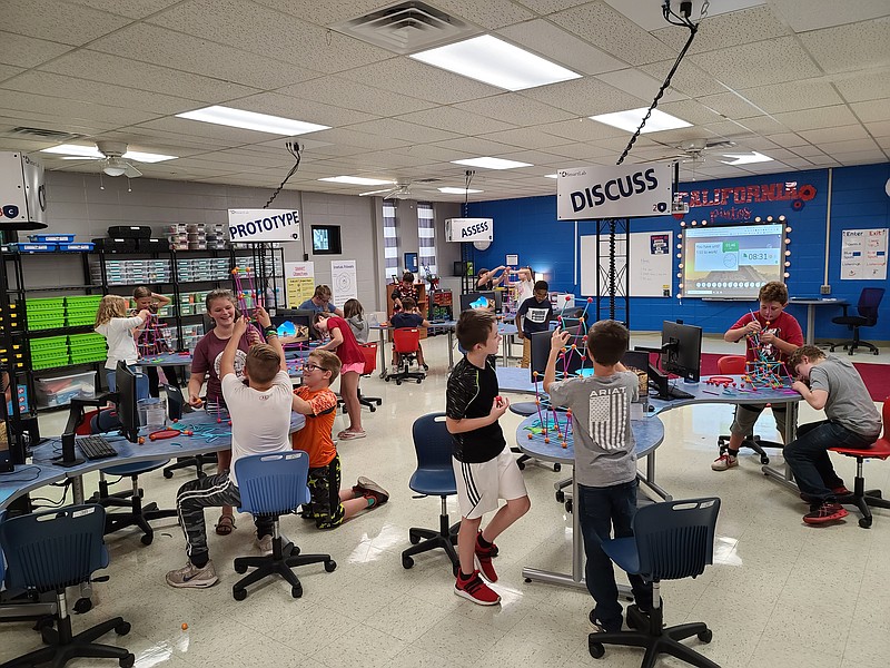 <p>Submitted</p><p>Mrs. Ferrell’s fifth grade students compete against each other to construct the tallest tower using Learning Resources Geometric Shapes kits in California Elementary School’s new SmartLab facility.</p>