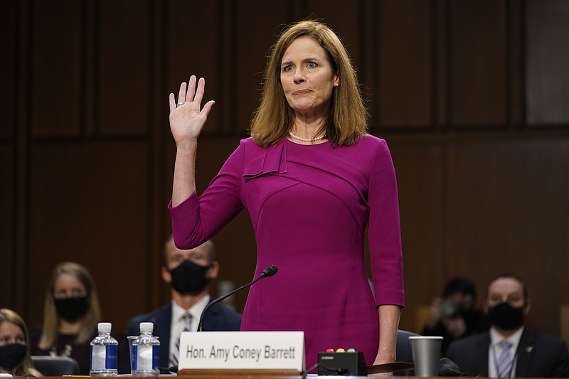 Supreme Court nominee Amy Coney Barrett is sworn in during a confirmation hearing before the Senate Judiciary Committee, Monday, Oct. 12, 2020, on Capitol Hill in Washington. (AP Photo/Patrick Semansky, Pool)