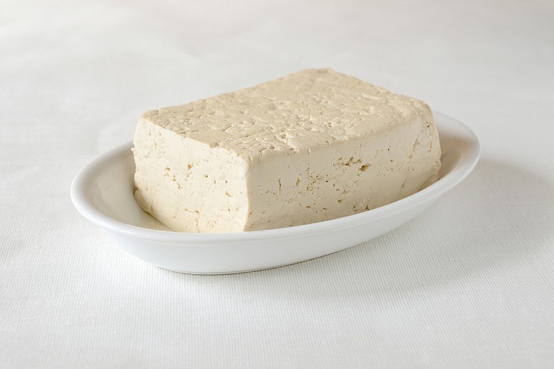 Tofu's affordable. It's low in fat and high in protein. And it's far removed from the coronavirus outbreaks tainting slaughterhouses, which has many reconsidering their relationship with meat for reasons beyond the virus. (Dreamstime/TNS)