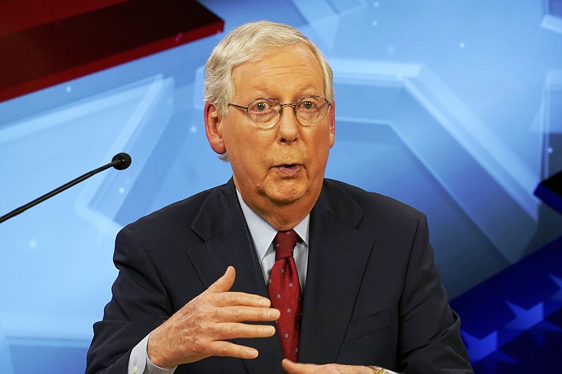 Senate Majority Leader Mitch McConnell, R-Ky., speaks during a debate with Democratic challenger Amy McGrath in Lexington, Ky., Monday, Oct. 12, 2020. (Michael Clubb/The Kentucky Kernel via AP, Pool)