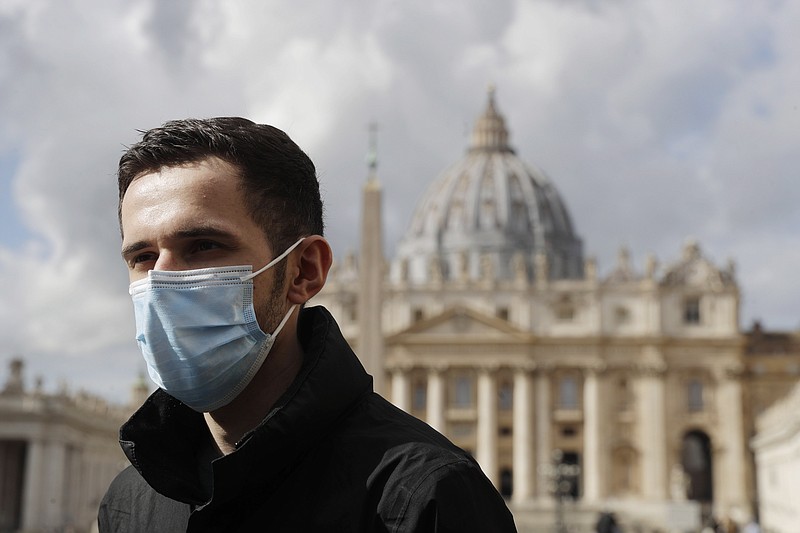 Whistleblower Kamil Jarzembowski meets journalists outside St. Peter's Square at the Vatican, Wednesday, Oct. 14, 2020. Two priests are going on trial in the Vatican’s criminal tribunal this week, one accused of sexually abusing an altar boy who served at papal Masses in St. Peter’s Basilica, and the other accused of covering it up. The proceedings starting Wednesday were forced on the Holy See after victims and Jarzembowski went public in 2017. (AP Photo/Gregorio Borgia)