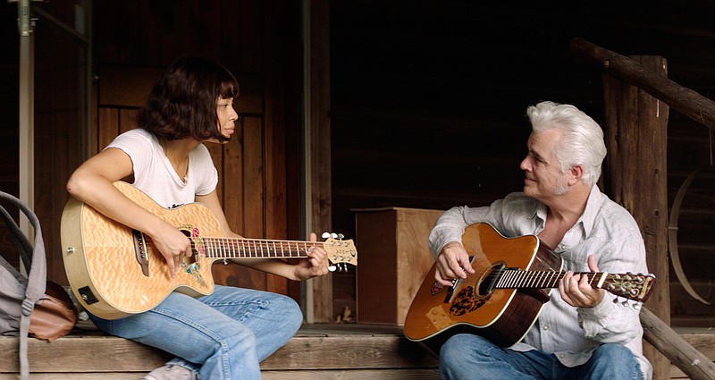 This image released by Sony Pictures shows Eva Noblezada, left, and Dale Watson in a scene from "Yellow Rose." (Sony Pictures via AP)
