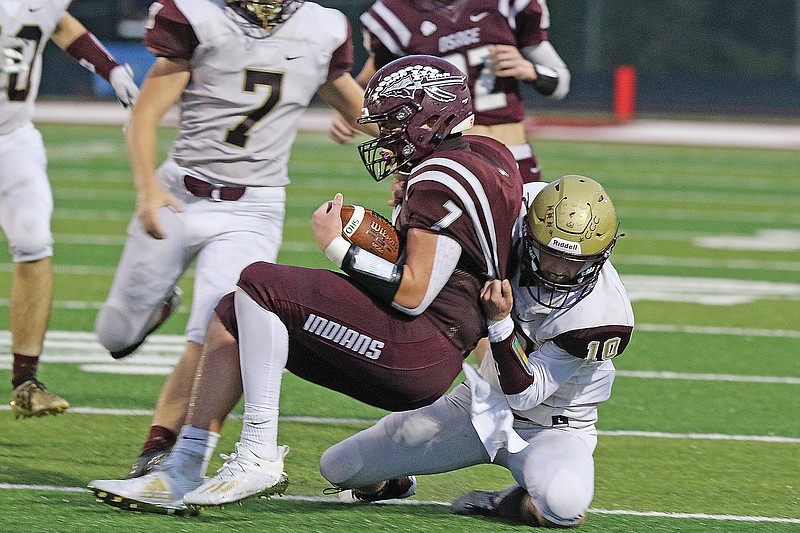 PJ Bledsoe of Eldon tackles Jack Creasy of School of the Osage during a game earlier this season in Osage Beach.