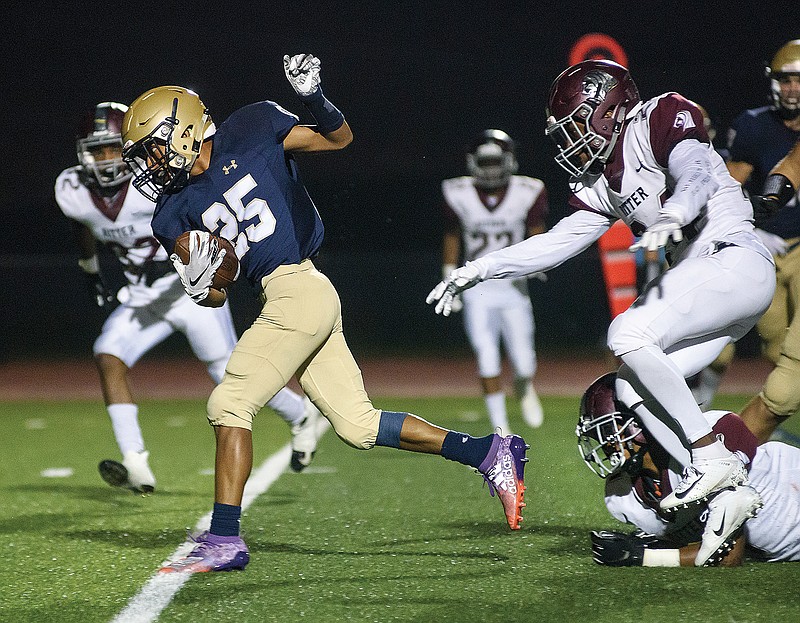 Helias running back Ryan Klahr breaks into open field and scoots into the end zone for a touchdown during last season's Homecoming game against Cardinal Ritter at Ray Hentges Stadium. Helias has added Cardinal Ritter to its 2020 schedule. The teams will play Oct. 23 at Ray Hentges Stadium.
