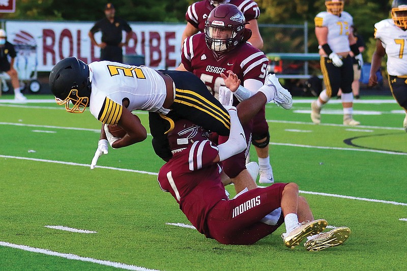 Konnor Vaughn of School of the Osage tackles Tyreion Logan of Fulton during a game earlier this season in Osage Beach.