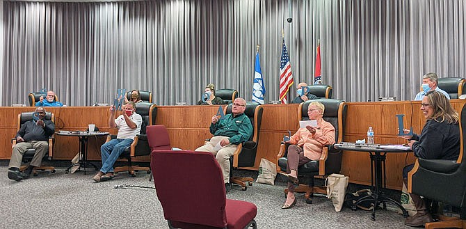 During Tuesday evening's Fulton City Council meeting, city officials paused to participate in filming a video for the Callaway Chamber of Commerce encouraging locals to "Shop Small."