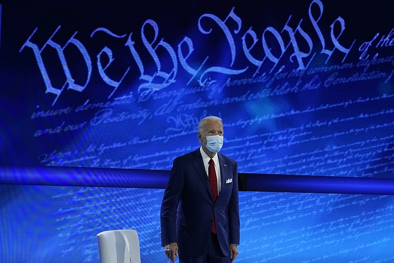 Democratic presidential candidate former Vice President Joe Biden arrives to participate in a town hall with moderator ABC News anchor George Stephanopoulos at the National Constitution Center in Philadelphia, Thursday, Oct. 15, 2020. (AP Photo/Carolyn Kaster)