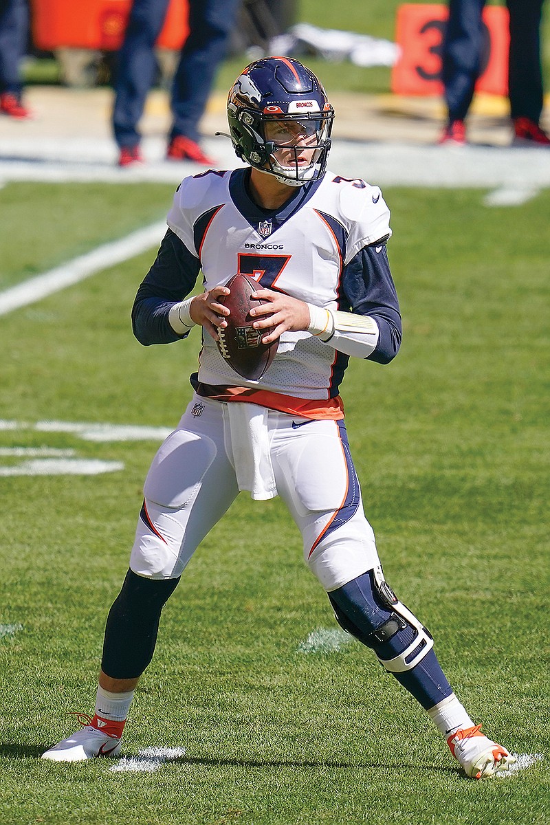 Broncos quarterback Drew Lock looks to throw during a game against the Steelers this season in Pittsburgh.