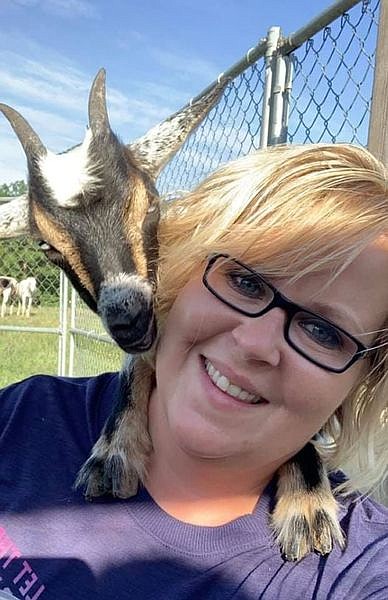 <p>Submitted</p><p>The columnist’s husband’s nurse, Michelle Perry, snaps a selfie with her goat, Rosie.</p>