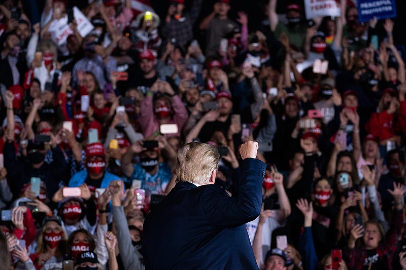 President Donald Trump arrives to speak to a campaign rally at Middle Georgia Regional Airport, Friday, Oct. 16, 2020, in Macon, Ga. (AP Photo/Evan Vucci)