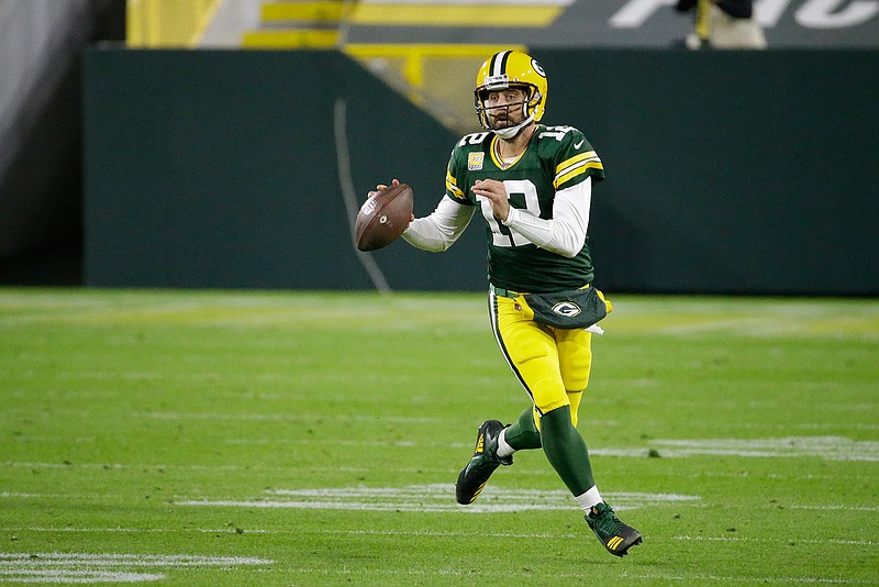 Green Bay Packers quarterback Aaron Rodgers (12) looks to throw during the second half of an NFL football game against the Atlanta Falcons, Monday, Oct. 5, 2020, in Green Bay, Wis. (AP Photo/Mike Roemer)