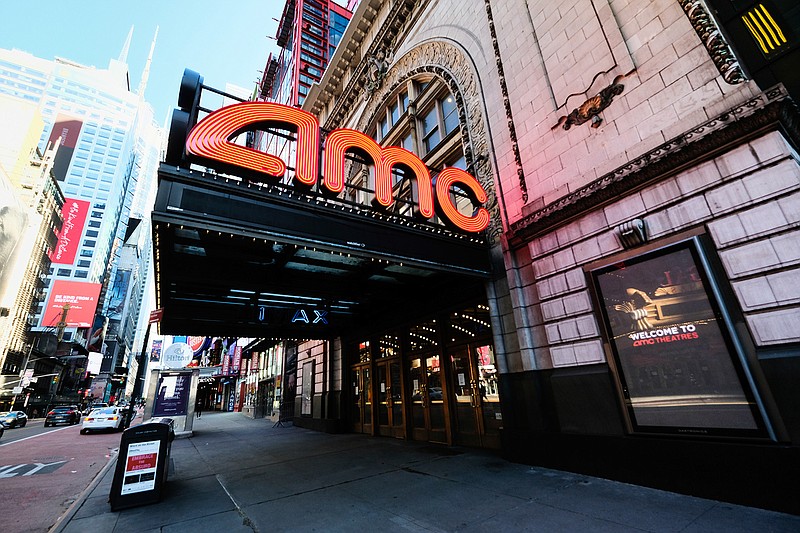 This May 13, 2020 file photo shows AMC Empire 25 theatre in Times Square in New York.  Gov. Andrew Cuomo announced limited reopening of theaters outside the city area, allowing 25 percent capacity, or a max of 50 people per screen beginning Oct. 23. (Photo by Evan Agostini/Invision/AP, File)