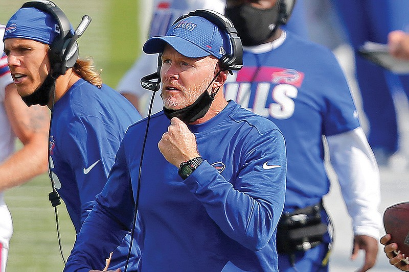 Bills head coach Sean McDermott pulls his mask down to give instructions on the sidelines during a game against the Jets this season in Orchard Park, N.Y. 