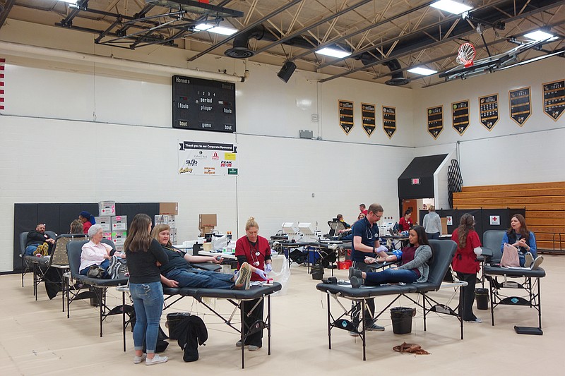 Teachers, community members and students donate blood in the Fulton High School gym in 2019. During the next couple of weeks, MU fans are encouraged to give blood during two Homecoming-themed American Red Cross blood drives in Fulton.