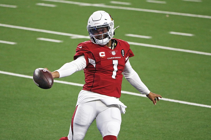 Cardinals quarterback Kyler Murray celebrates running the ball for a touchdown in the second half of Monday night's game against the Cowboys in Arlington, Texas.
