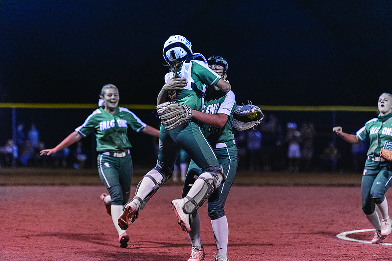 Blair Oaks catcher Ellie Kliethermes jumps into the arms of pitcher Alexis Findley after Findley struck out the final batter in Thursday's Class 3 state quarterfinal game against Centralia at Toalson Bicentennial Park in Centralia.
