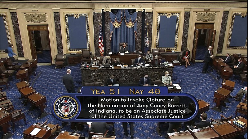 In this image from video, the vote total in the U.S. Senate to advance the nomination of Supreme Court nominee Amy Coney Barrett for a final confirmation vote at the U.S. Capitol in Washington, Sunday, Oct. 25, 2020. (Senate Television via AP)
