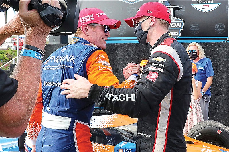 Josef Newgarden (right) congratulates Scott Dixon on the IndyCar Series championship following Sunday's IndyCar race in St. Petersburg, Fla.