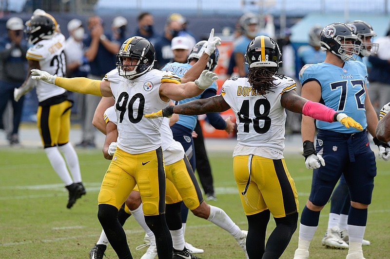 Pittsburgh Steelers outside linebackers T.J. Watt (90) and Bud Dupree (48) celebrate after a 45-yard field goal attempt by Tennessee Titans kicker Stephen Gostkowski was no good in the final seconds of the fourth quarter in an NFL football game Sunday, Oct. 25, 2020, in Nashville, Tenn. The Steelers won 27-24. (AP Photo/Mark Zaleski)