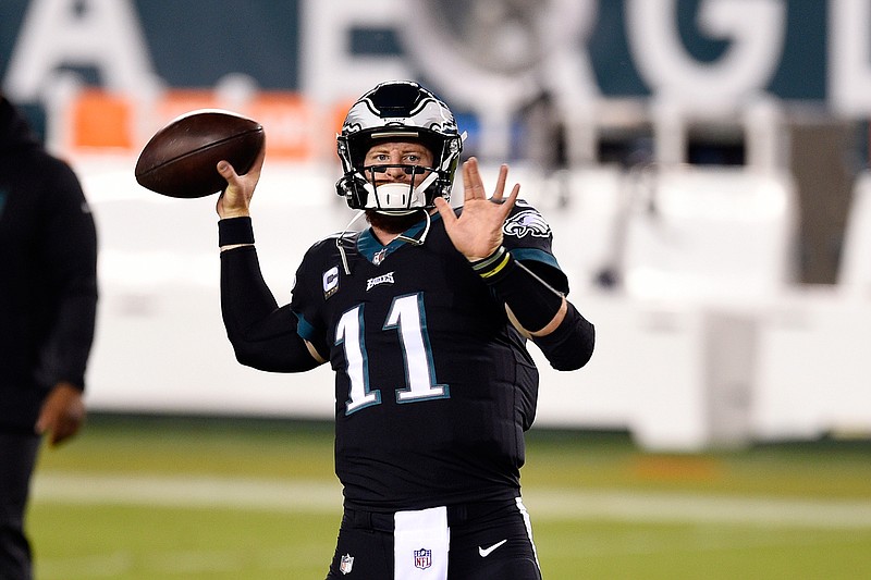 Philadelphia Eagles' Carson Wentz warms up before an NFL football game against the New York Giants, Thursday, Oct. 22, 2020, in Philadelphia. (AP Photo/Derik Hamilton)