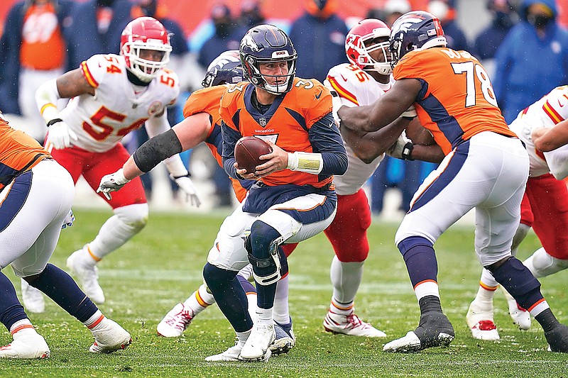 Broncos quarterback Drew Lock drops back during the second half of Sunday's game against the Chiefs in Denver.