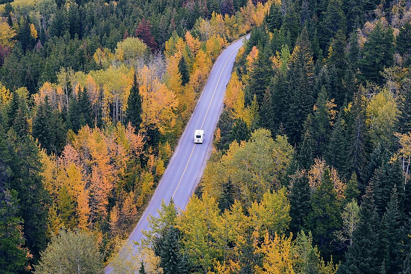 In this photo by Tim Gouw on Unsplash, an RV travels the open road through trees displaying their fall foliage in Jasper, Canada. The brisk air, falling leaves and bright colors of autumn inspire families to harvest new plans.