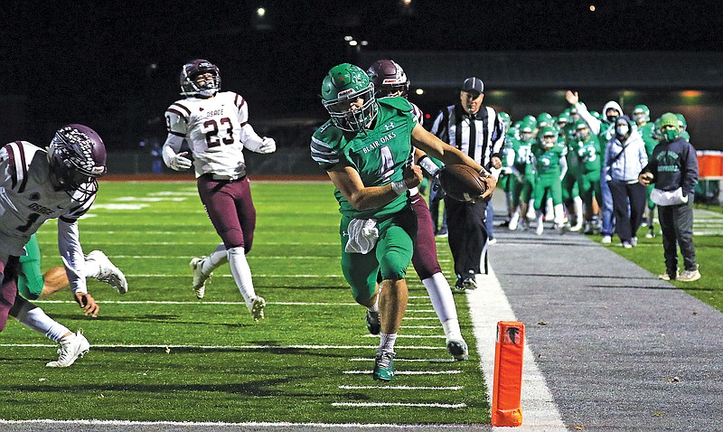 Blair Oaks running back Jayden Purdy runs along the sideline on his way to a touchdown during last Friday night's game against School of the Osage at the Falcon Athletic Complex in Wardsville.