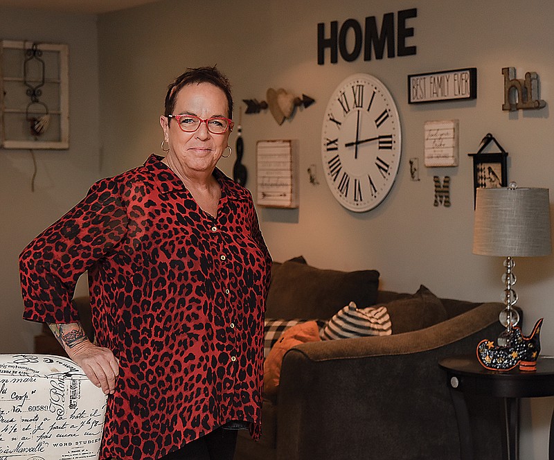 Gwen McGeorge poses in her Jefferson City home.